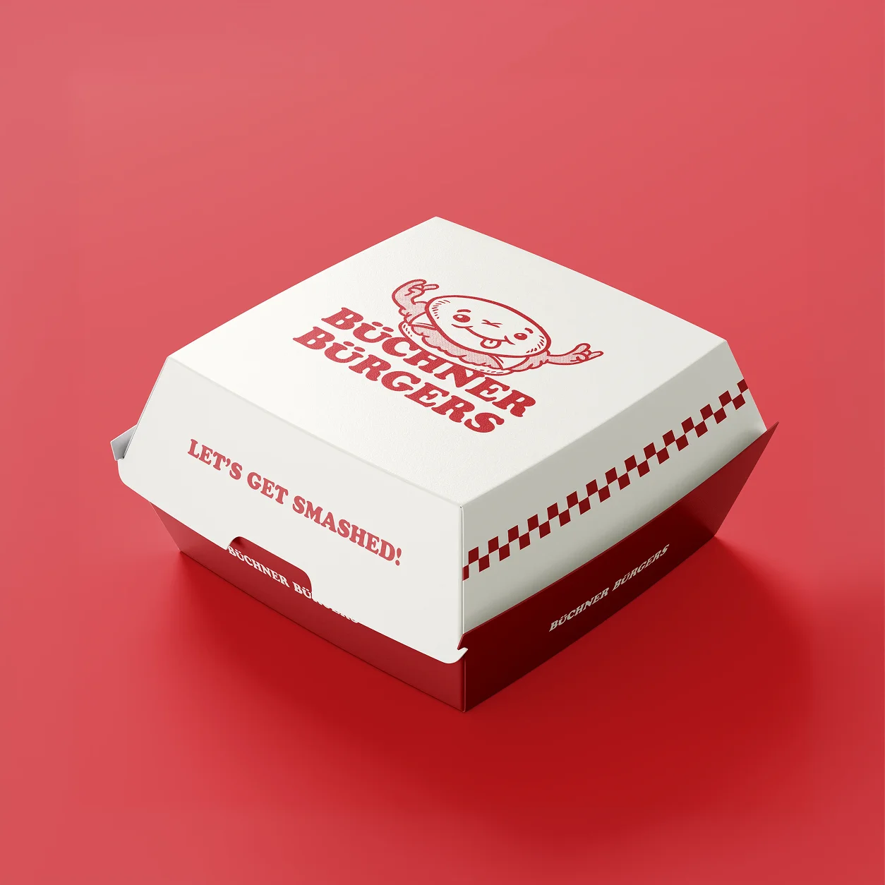 Takeout box for Buchner Burgers featuring playful graphics and the slogan "LET'S GET SMASHED!" on a red background.