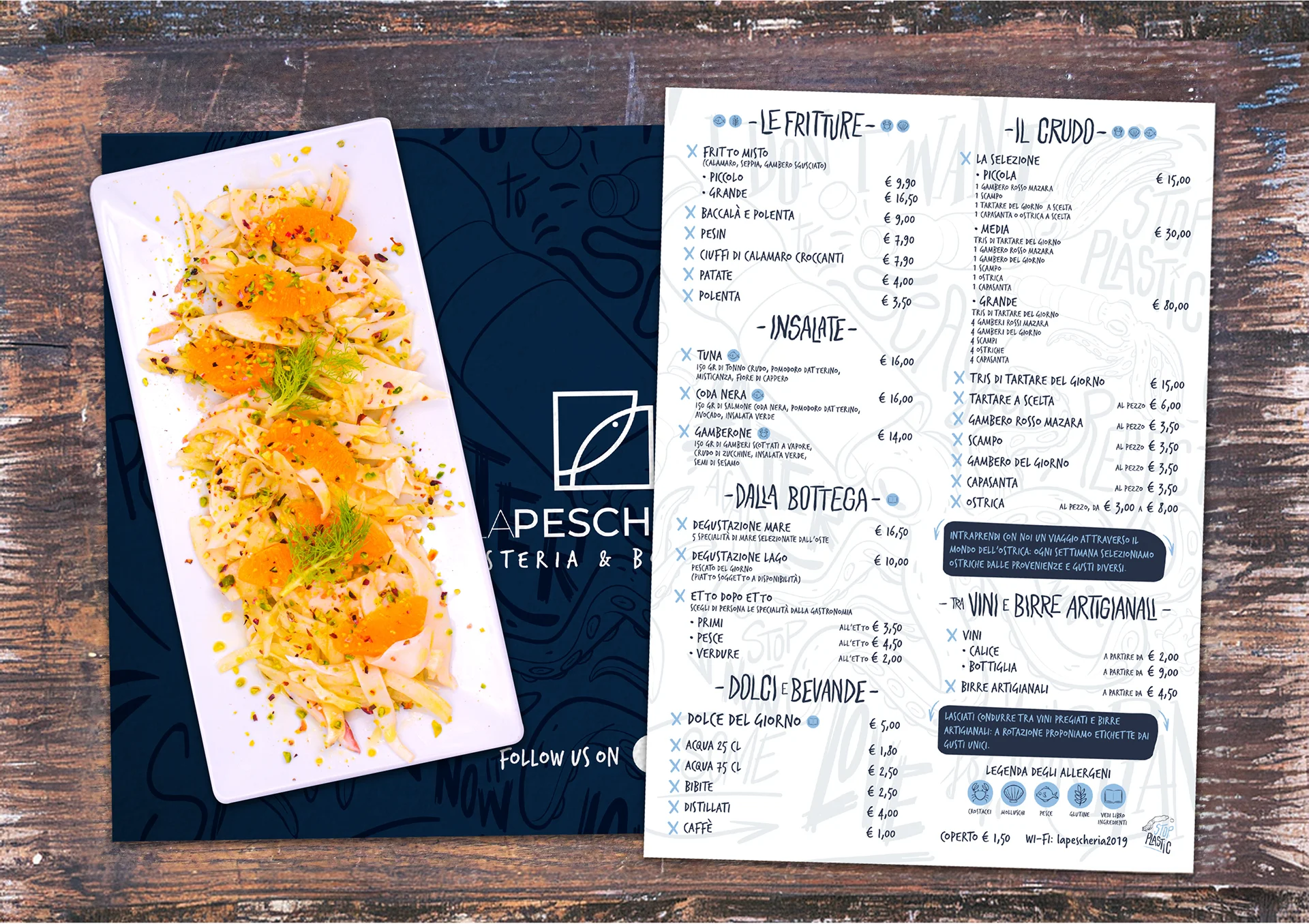 A seafood dish with garnishes on a plate alongside a restaurant menu featuring various food items and prices.