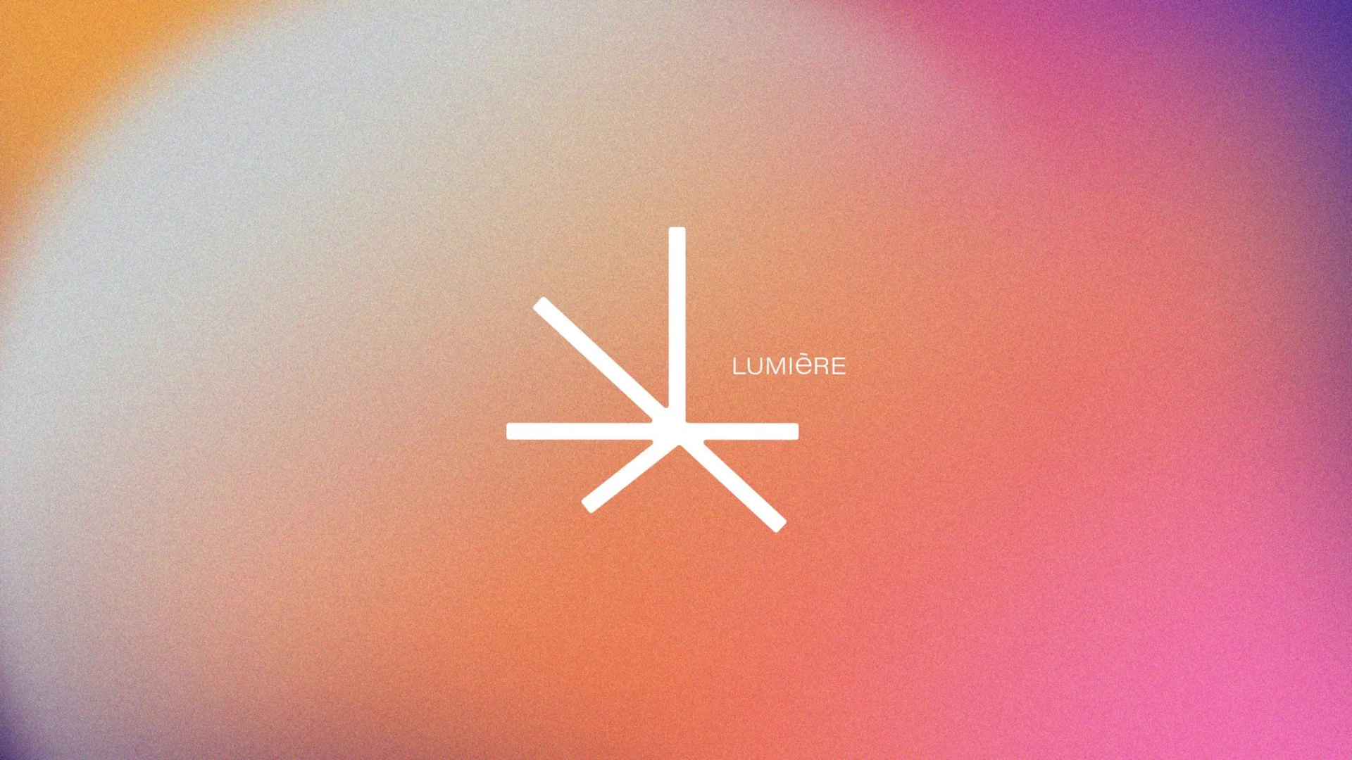 Logo featuring a minimalist starburst design in white on a colorful gradient background with the word "Lumière.